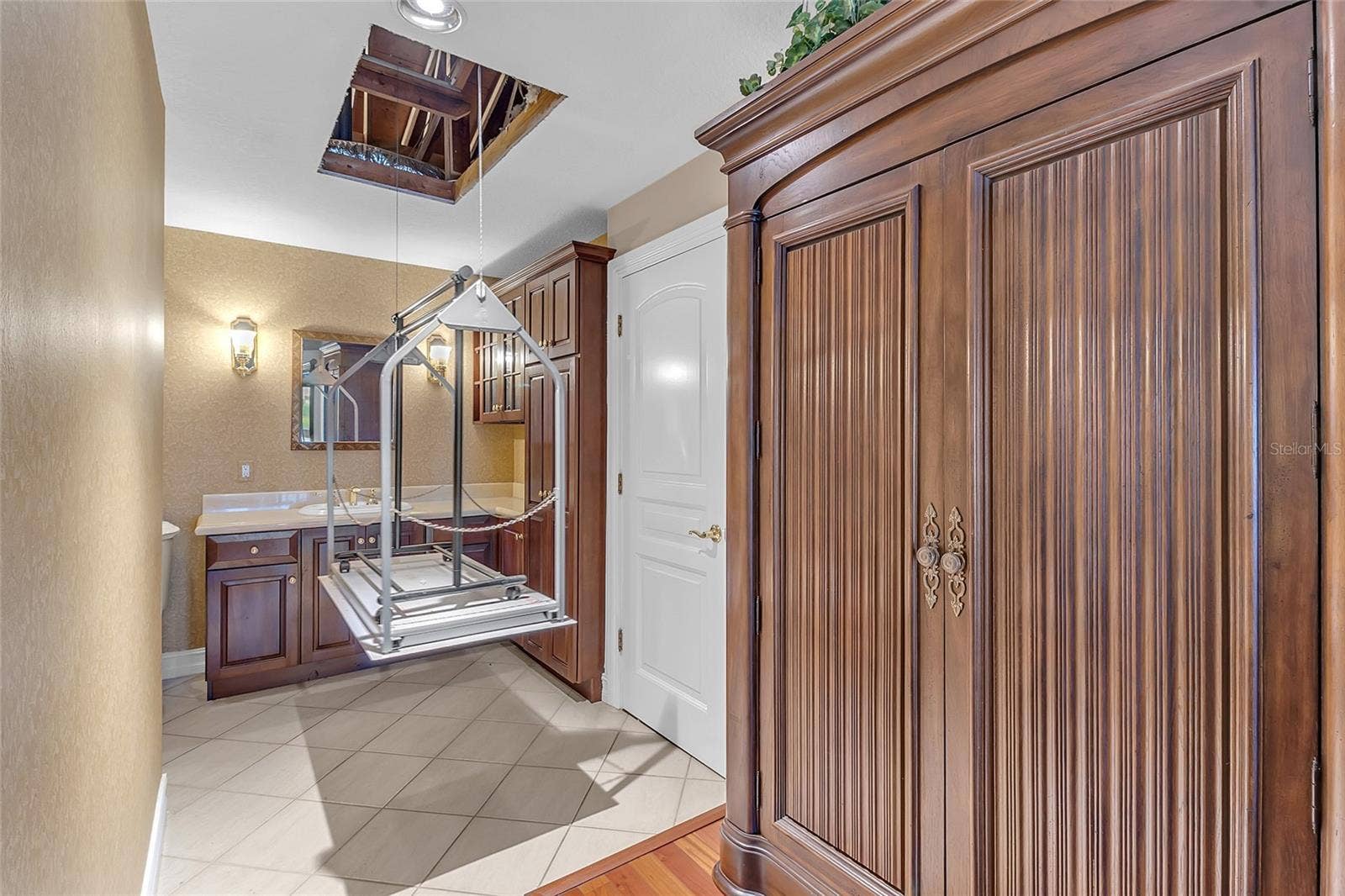 4113 FAIRVIEW VISTA POINT, #311, Orlando, FL 32804 Convenient Lift Providing Access to Additional Attic Storage and Closet Space
