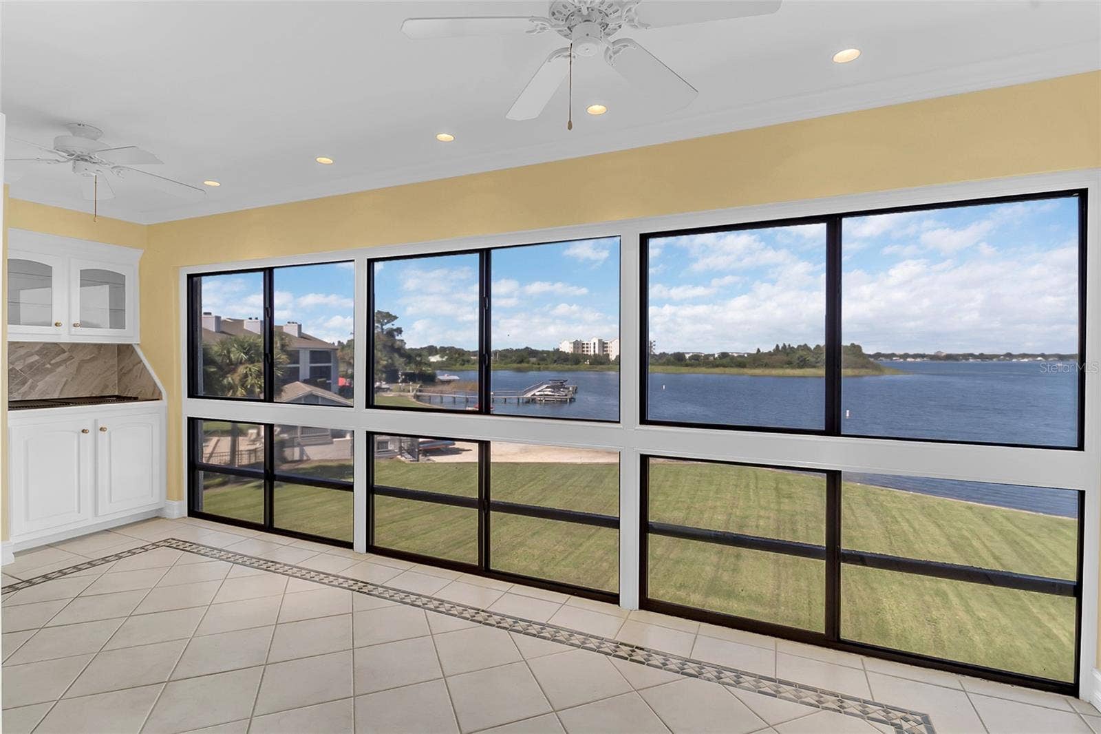 4113 FAIRVIEW VISTA POINT, #311, Orlando, FL 32804 Lake View of Balcony and Indoor Grill