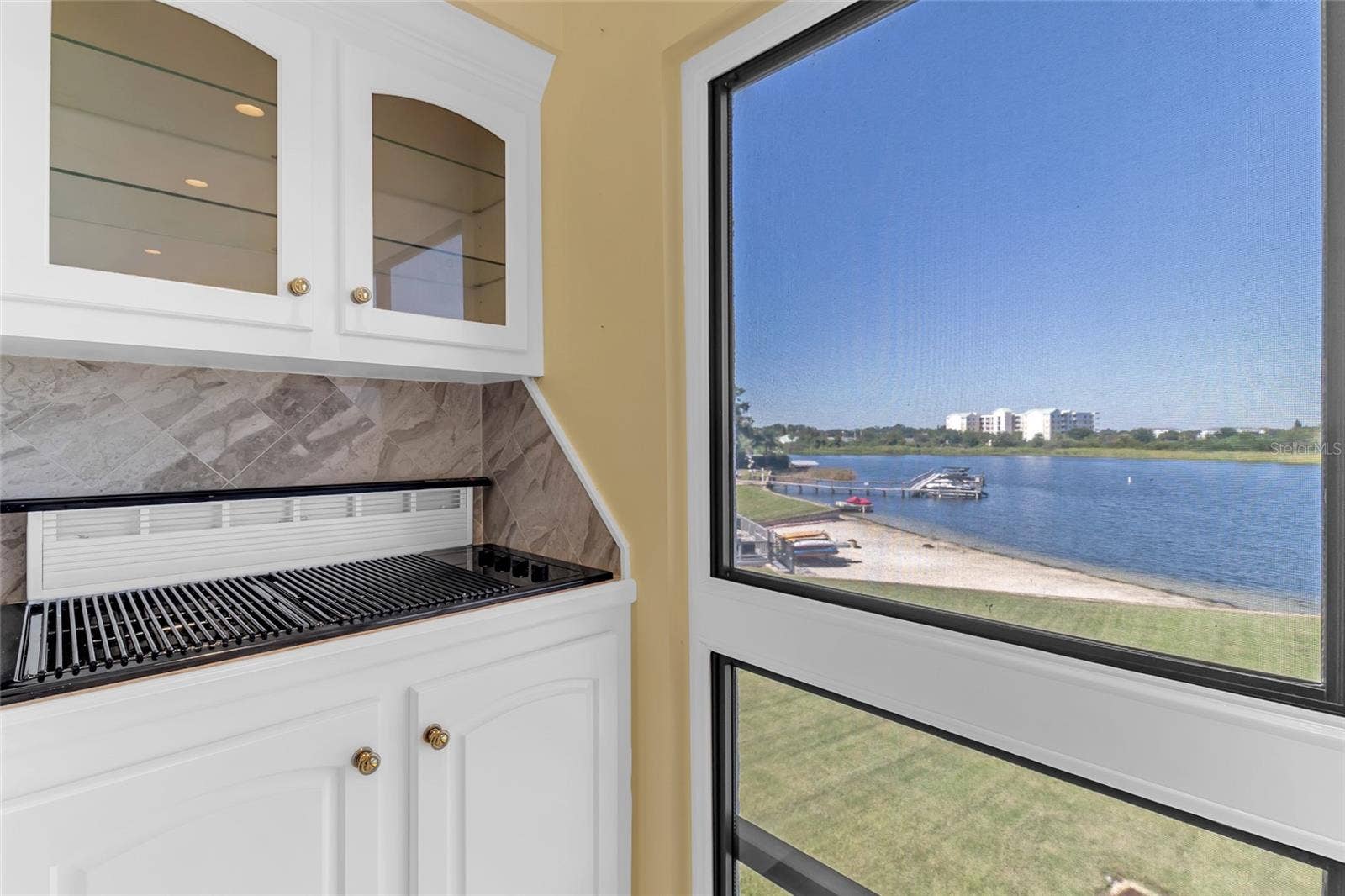 4113 FAIRVIEW VISTA POINT, #311, Orlando, FL 32804 Built-In Grill Area with Custom Cabinetry and Beautiful Views of Lake
