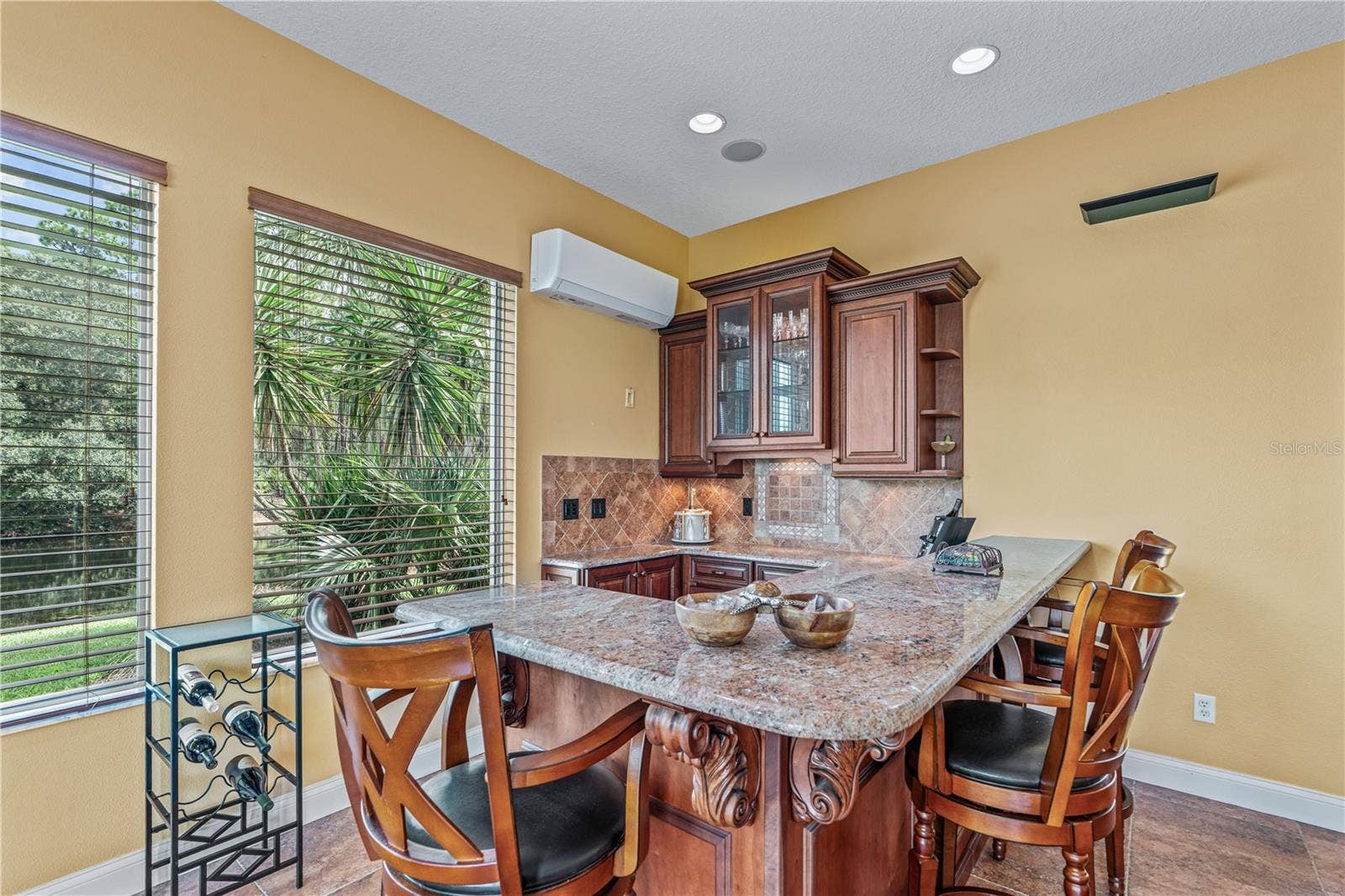 1025 W HAMPSTEAD LANE LANE, Ormond Beach, FL 32174 Game Room Wet Bar And Seating Area