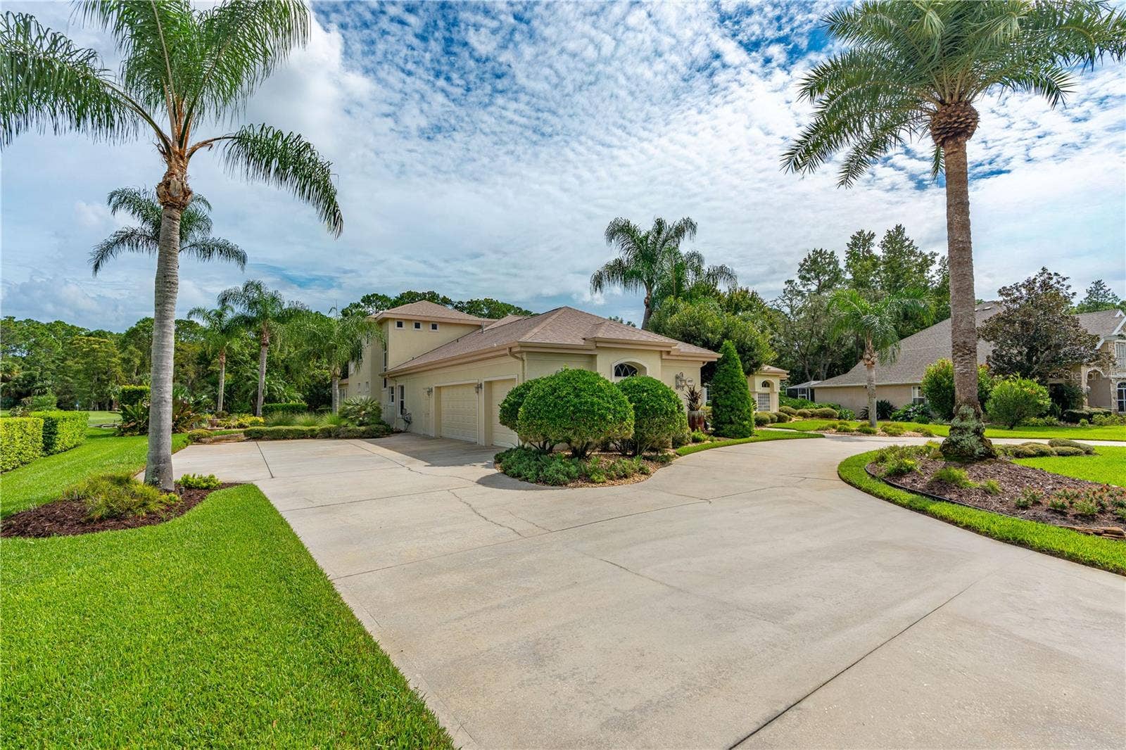 1025 W HAMPSTEAD LANE LANE, Ormond Beach, FL 32174 Front Exterior-Expansive Circular Driveway