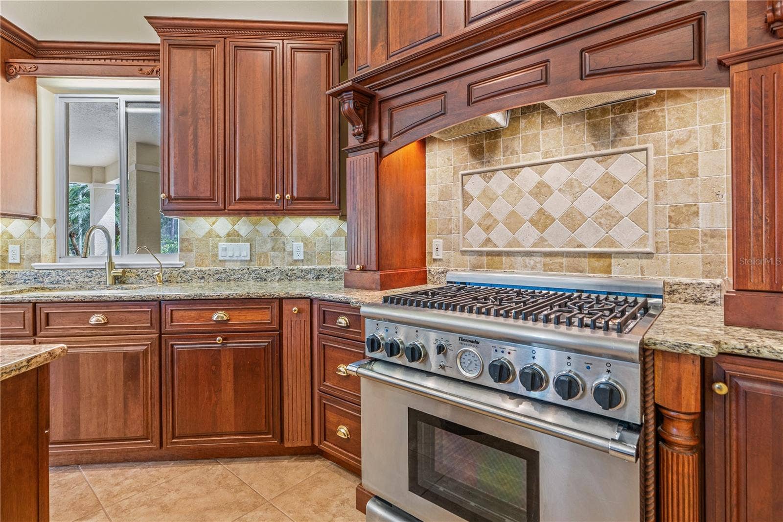 1025 W HAMPSTEAD LANE LANE, Ormond Beach, FL 32174 Kitchen-View Of Range & Cabinetry