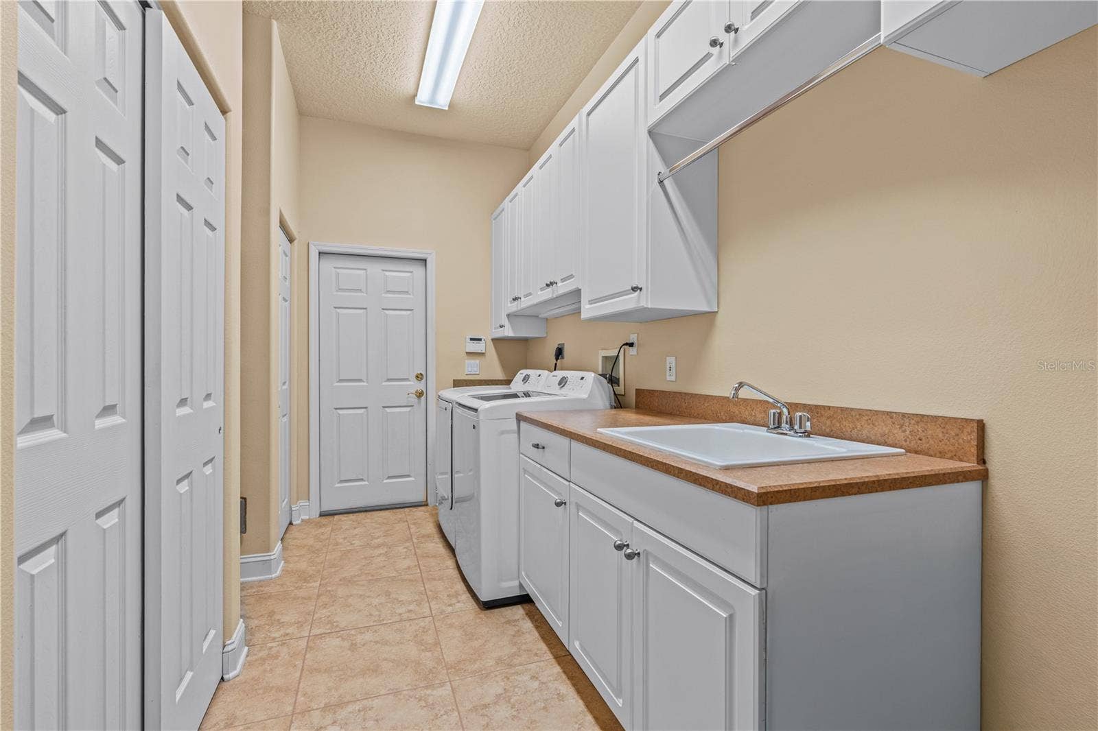 1025 W HAMPSTEAD LANE LANE, Ormond Beach, FL 32174 Laundry Room