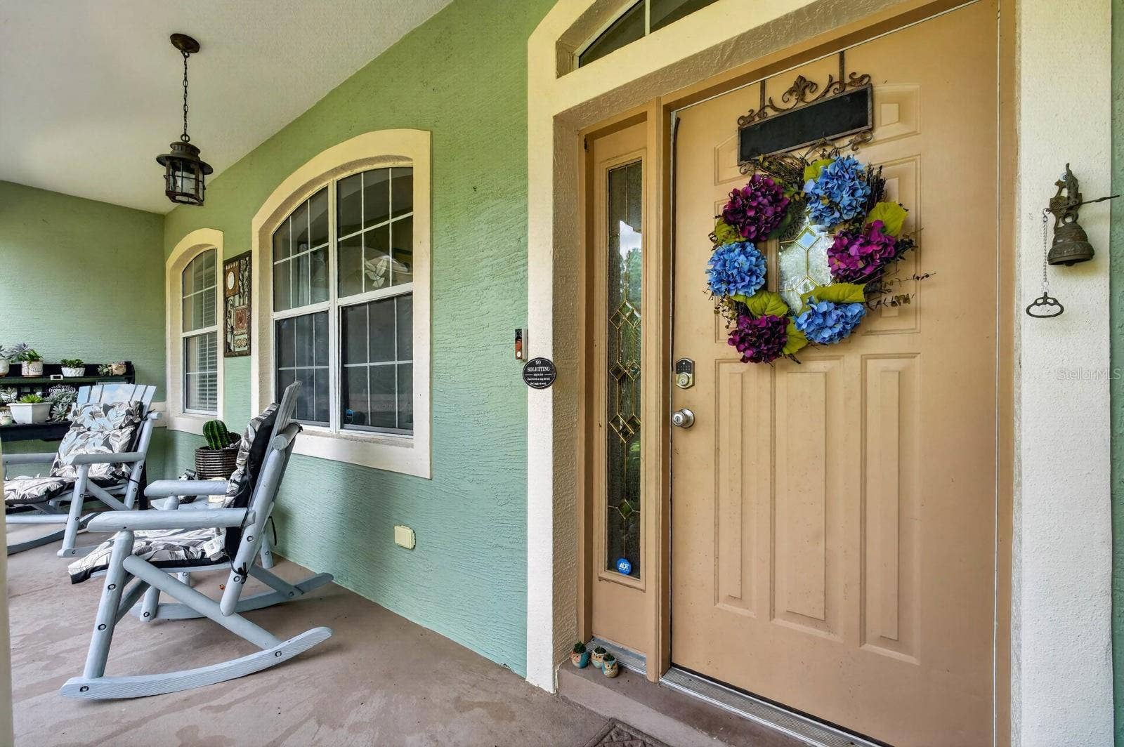 72 KARAS TRAIL, Palm Coast, FL 32164 front entrance has nice covered porch landing