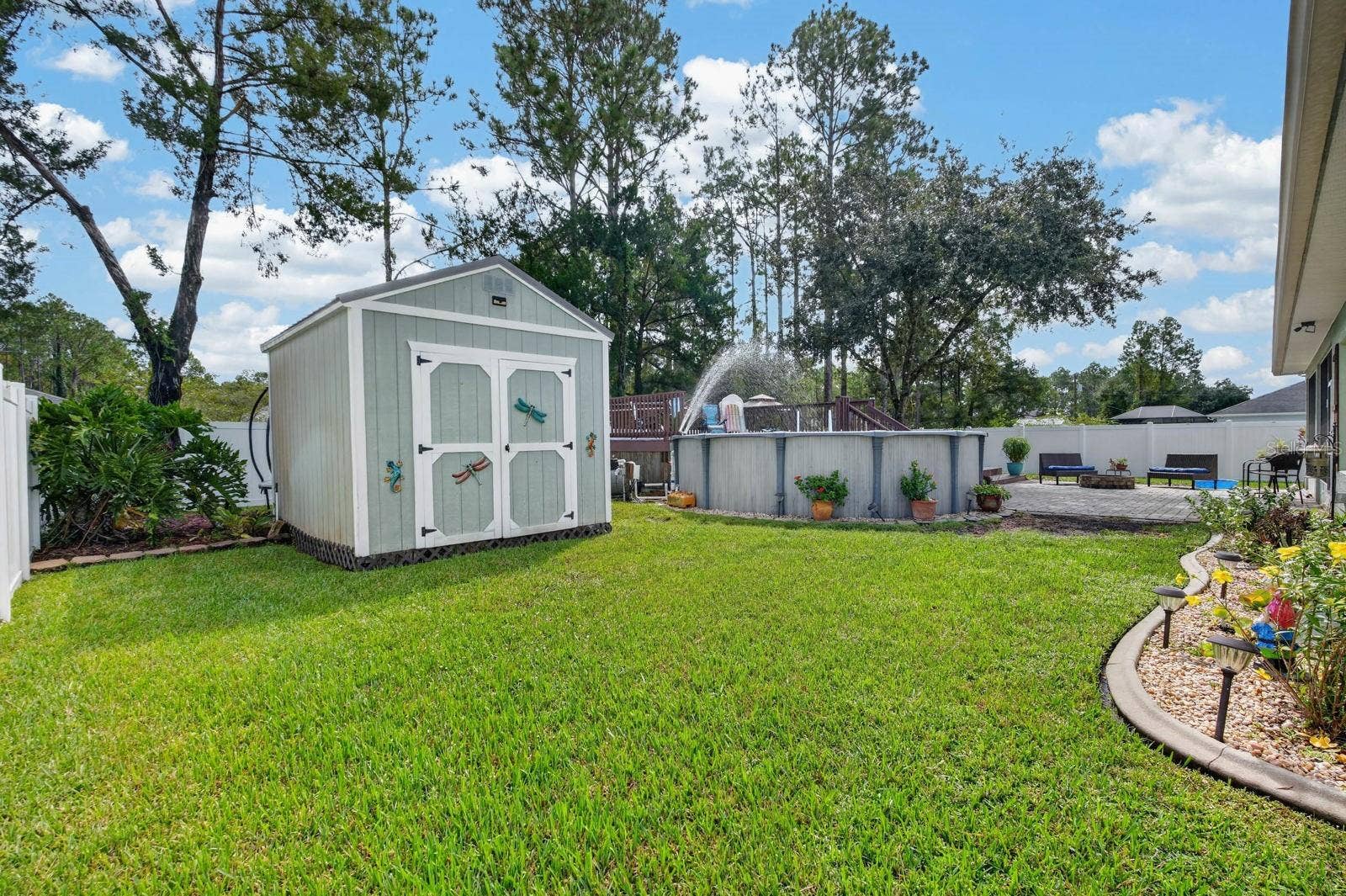 72 KARAS TRAIL, Palm Coast, FL 32164 Large shed has electricity and loft