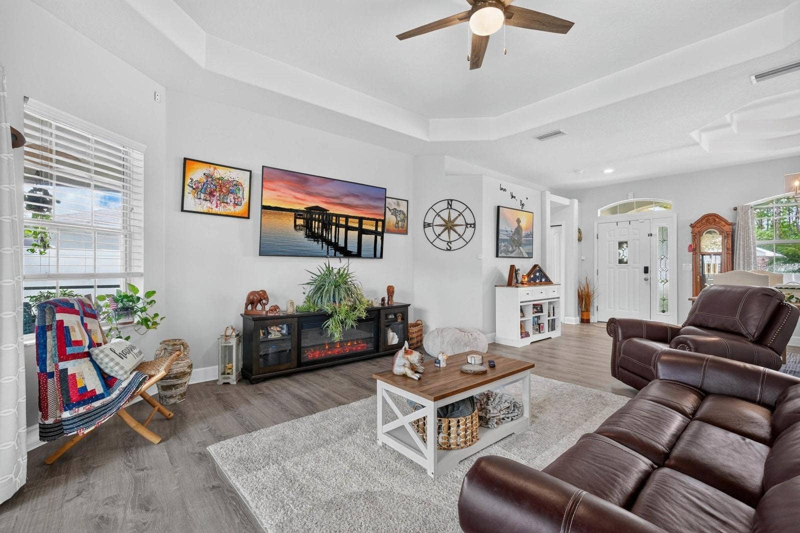 72 KARAS TRAIL, Palm Coast, FL 32164 Living room has high ceiling, ceiling fan and tray