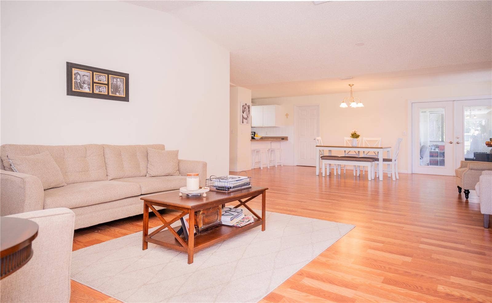 Front door entry leading into the spacious living room.