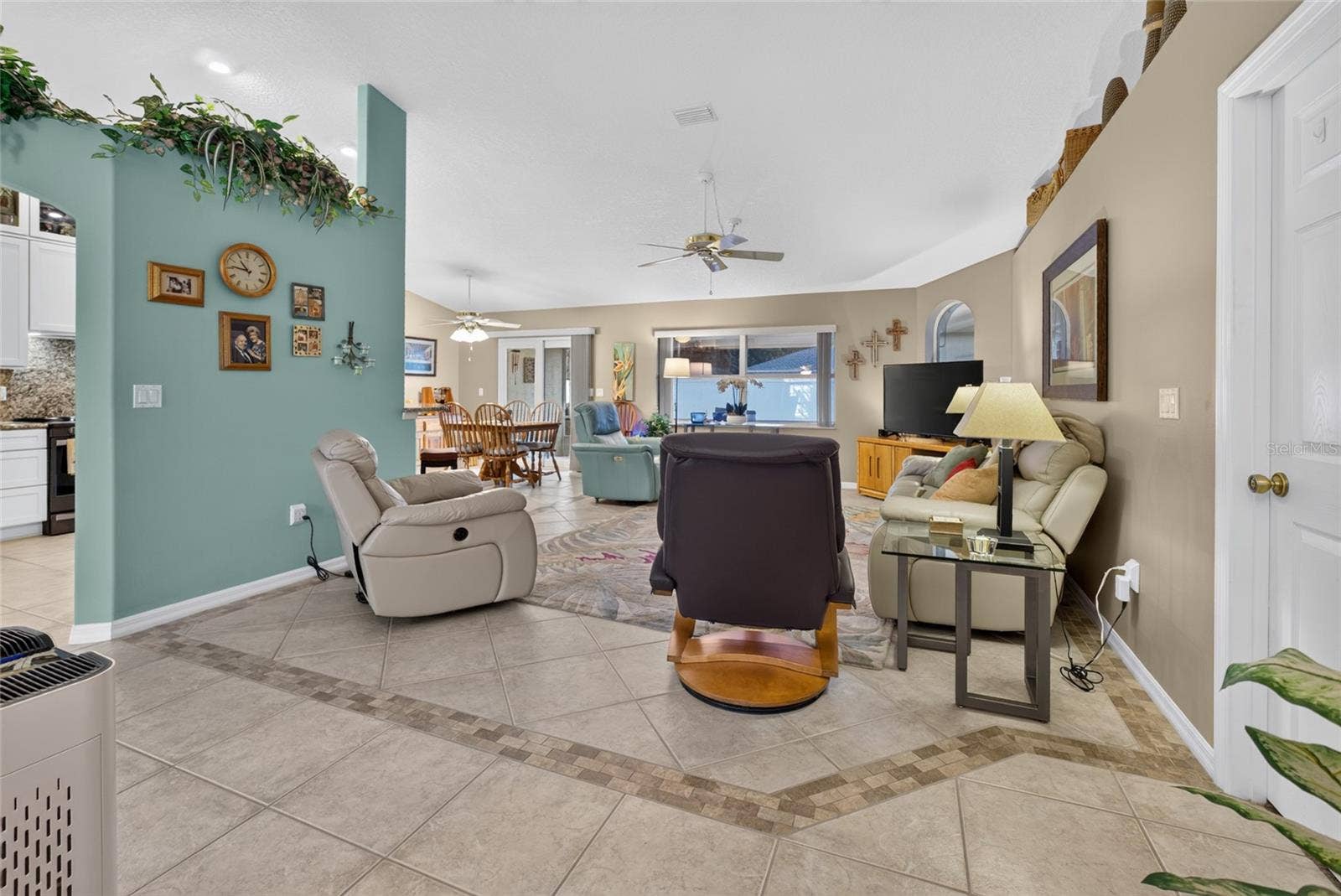 110 BURROUGHS DRIVE, Palm Coast, FL 32137 Open floor plan to living and dining rooms