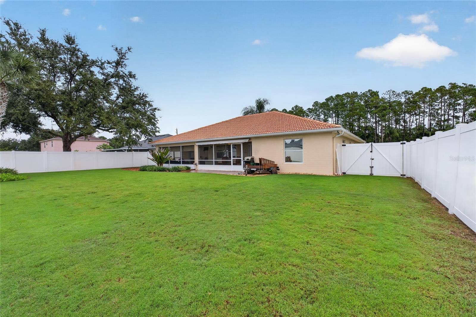 110 BURROUGHS DRIVE, Palm Coast, FL 32137 Totally fenced yard.