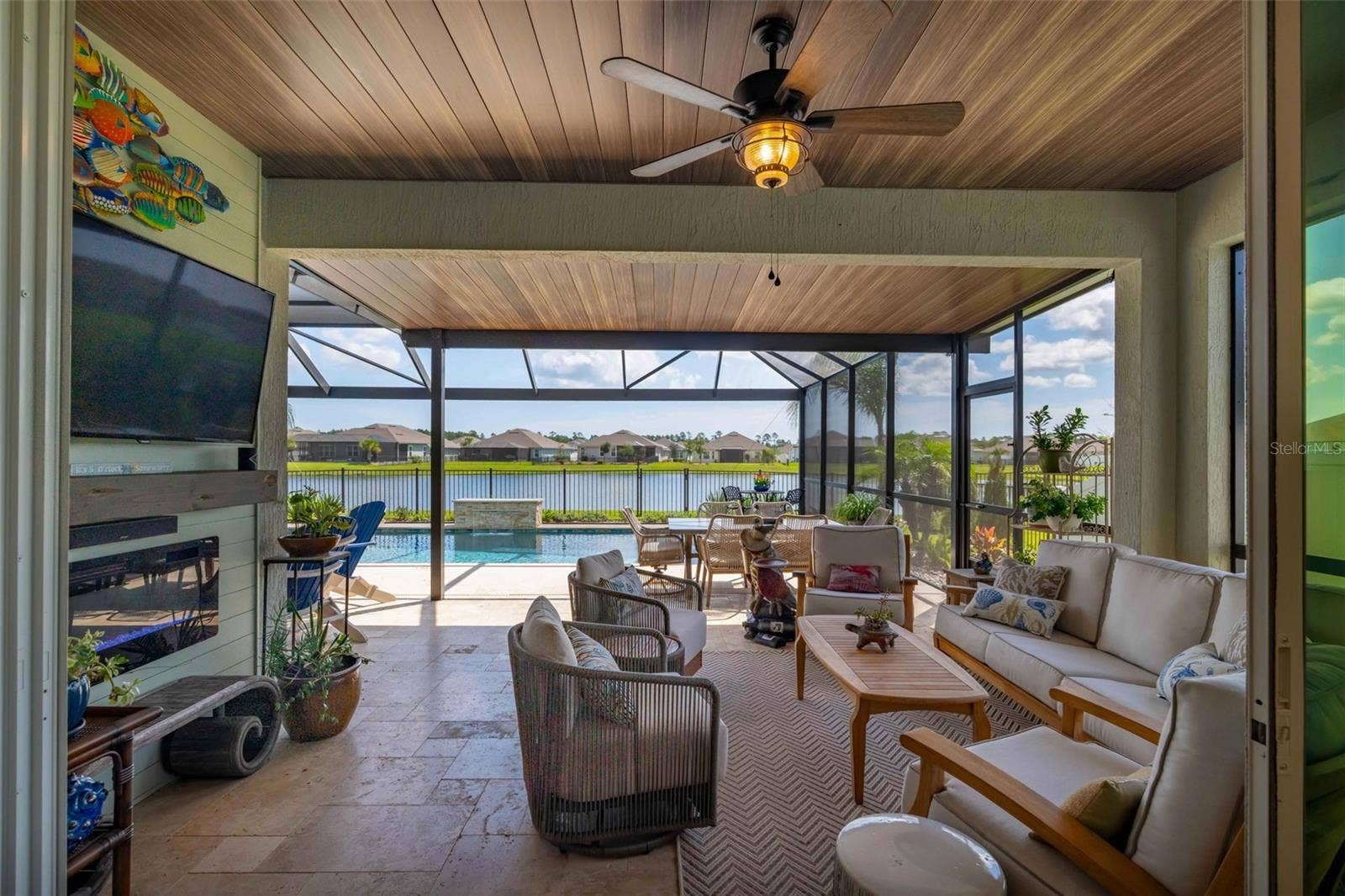 627 OCEAN JASPER DRIVE, St Augustine, FL 32086 Entertainment center with built-in electric fireplace, lighting, and added electrical outlets.