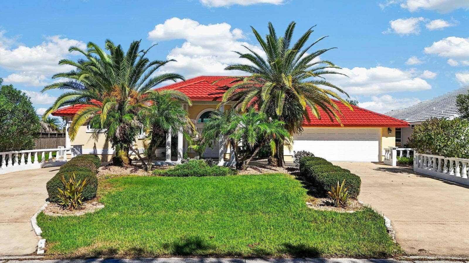 74 COVINGTON LANE, Palm Coast, FL 32137 Palm-Lined Home With Circular Driveway