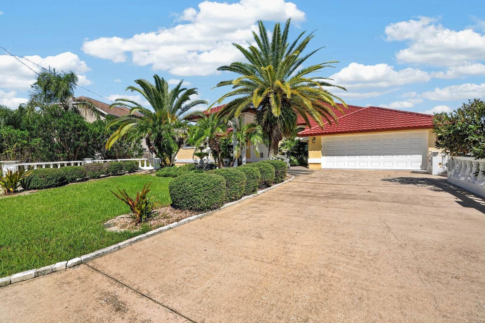 74 COVINGTON LANE, Palm Coast, FL 32137 Impressive Home with Mature Palms