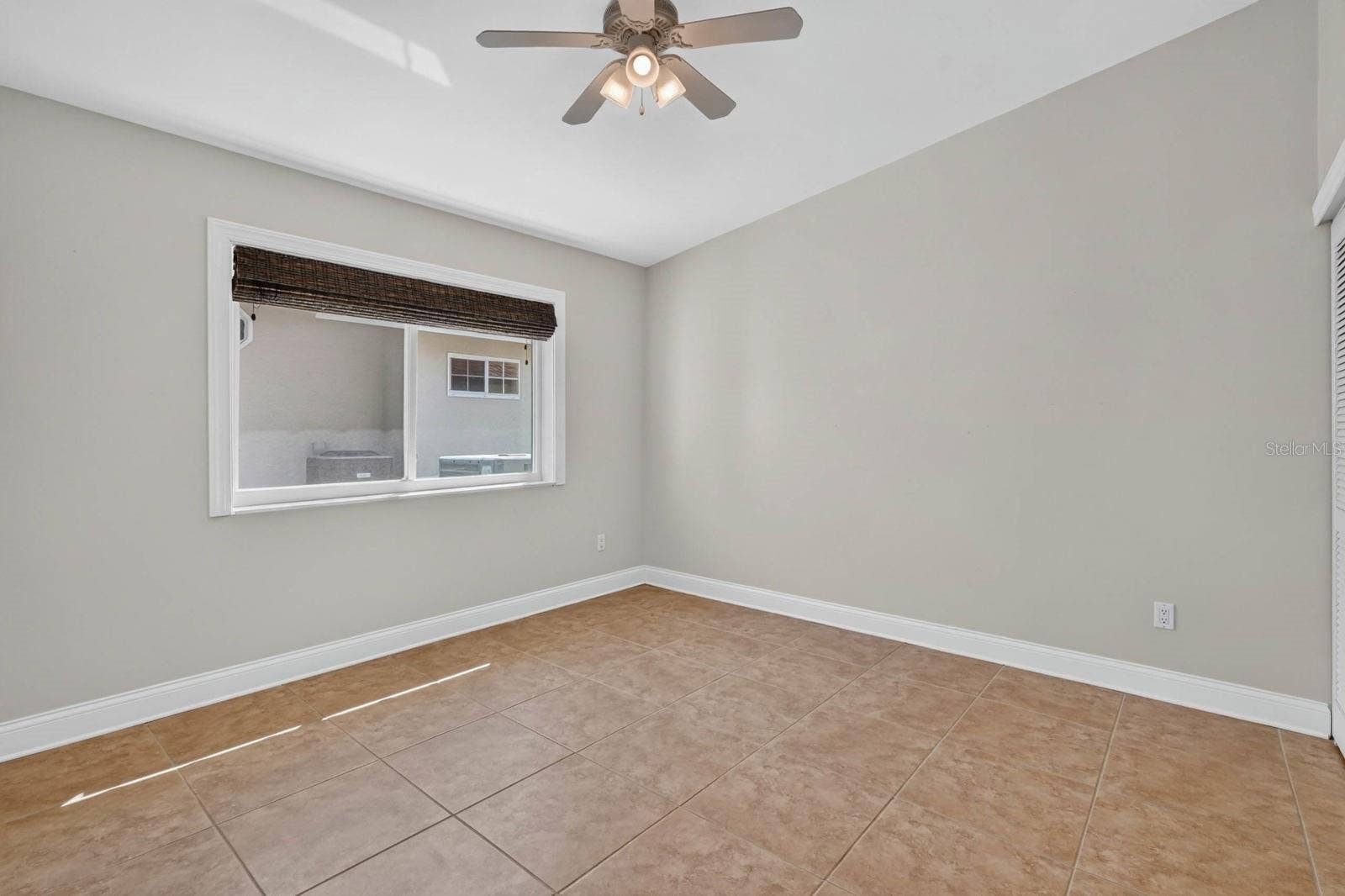 74 COVINGTON LANE, Palm Coast, FL 32137 Bright Bedroom With Tile Flooring