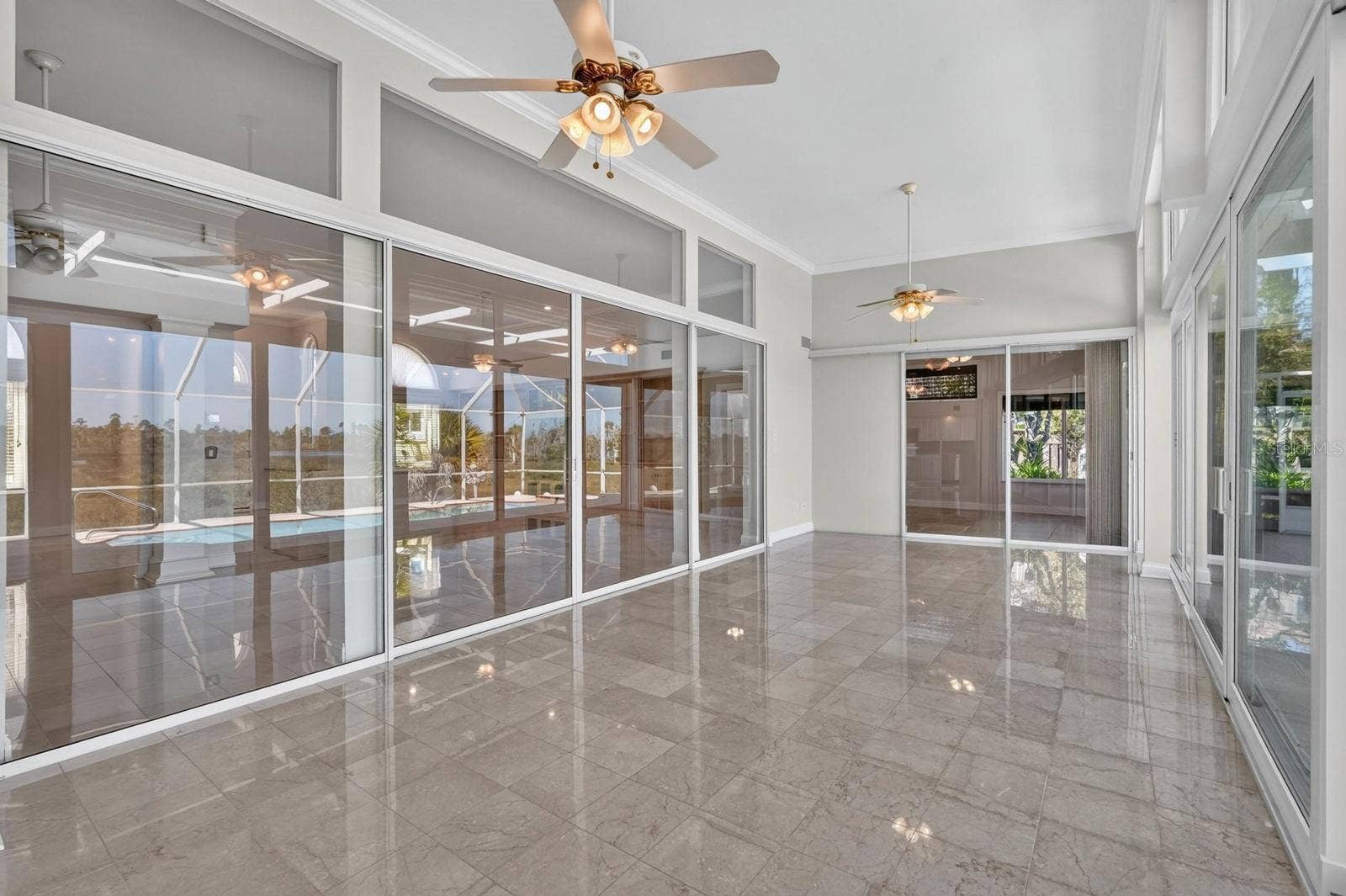 74 COVINGTON LANE, Palm Coast, FL 32137 Sunlit Florida Room Retreat