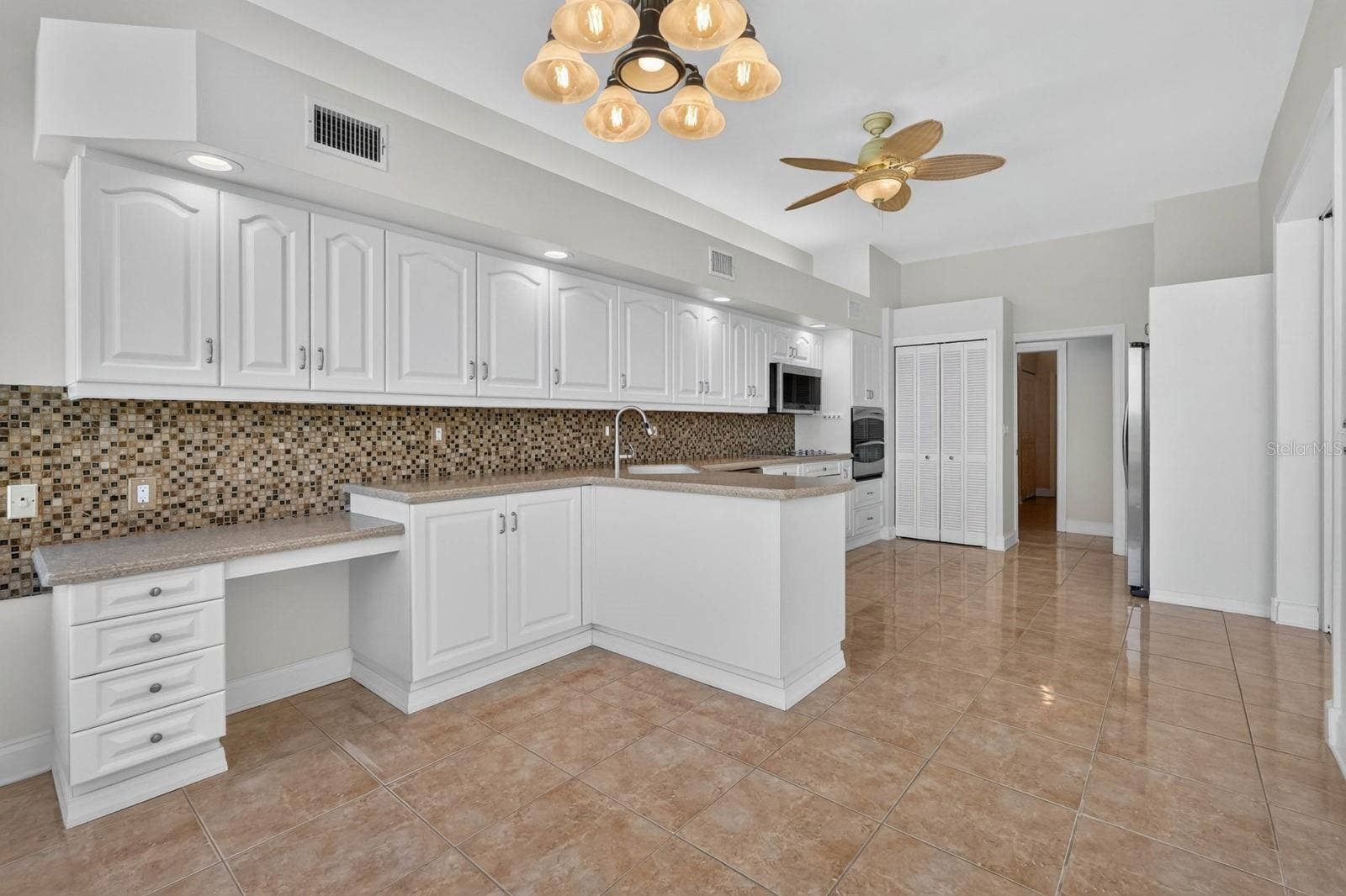 74 COVINGTON LANE, Palm Coast, FL 32137 Generous Countertop and Cabinet Space
