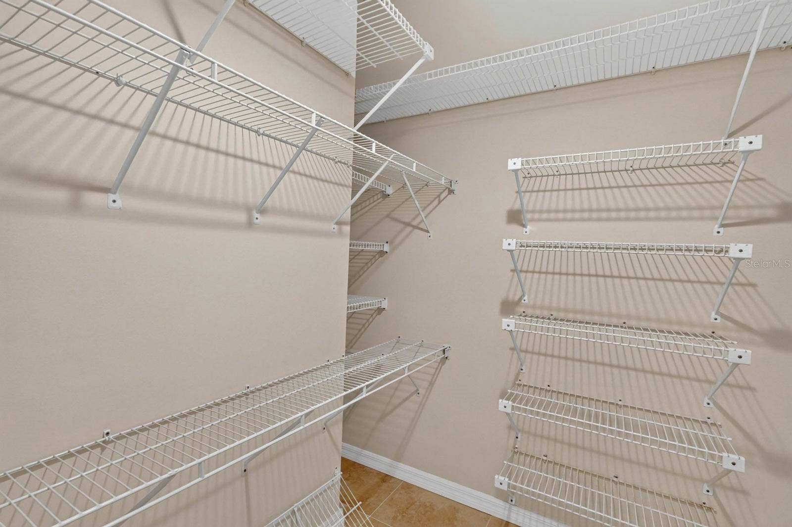 74 COVINGTON LANE, Palm Coast, FL 32137 Walk-In Closet With Ample Shelving