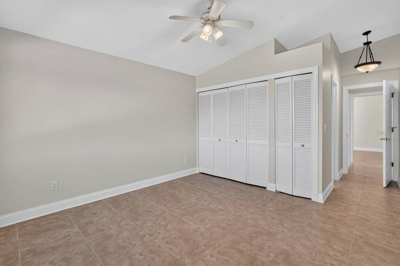 74 COVINGTON LANE, Palm Coast, FL 32137 Bedroom With Generous Closet Space