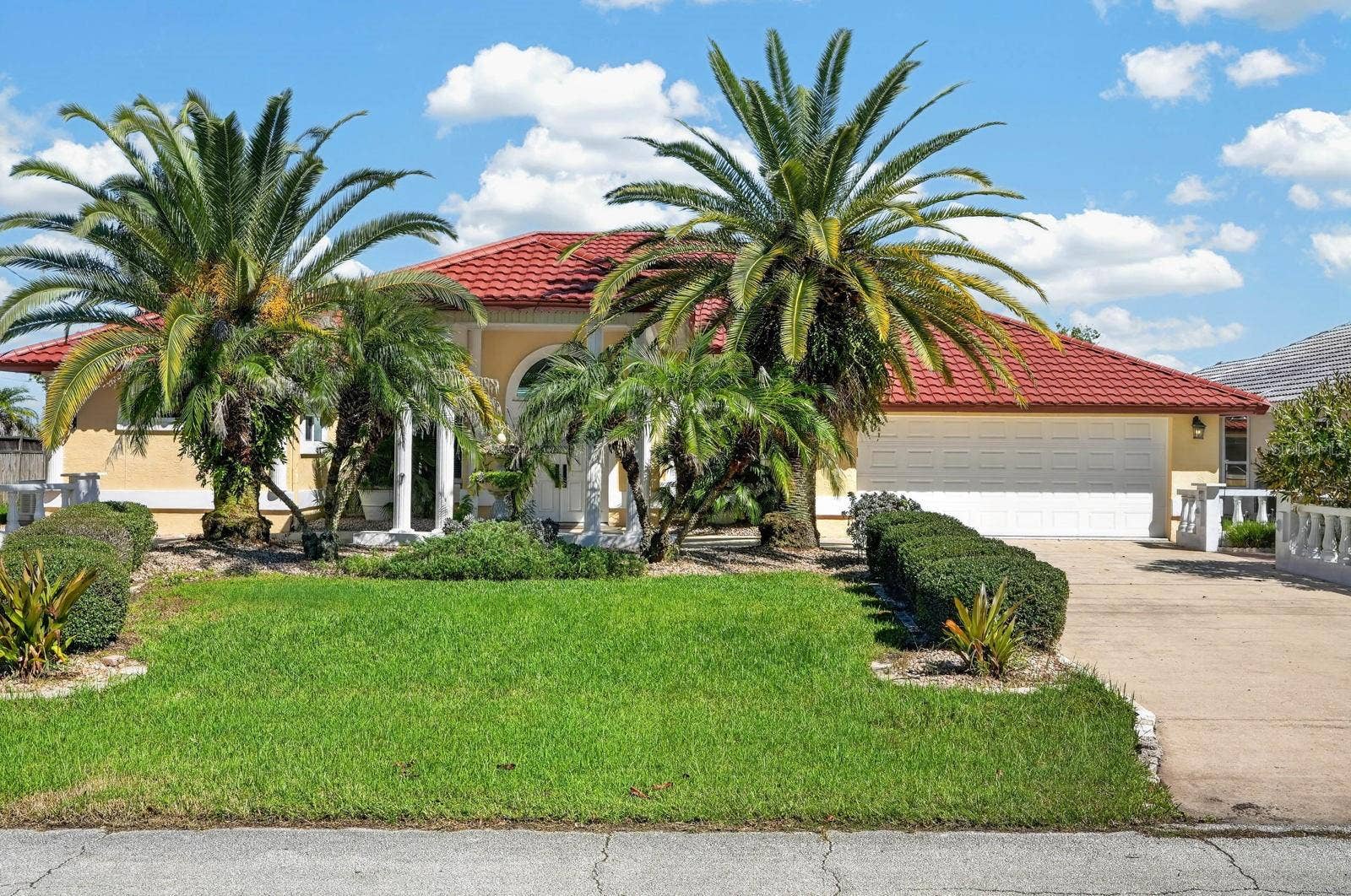 74 COVINGTON LANE, Palm Coast, FL 32137 Beautiful Home with Tropical Landscaping