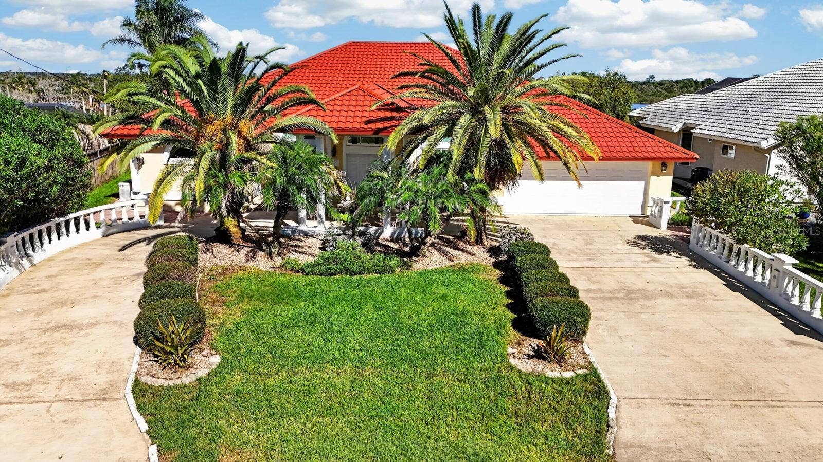 74 COVINGTON LANE, Palm Coast, FL 32137 Elevated View of Tropical Landscaping