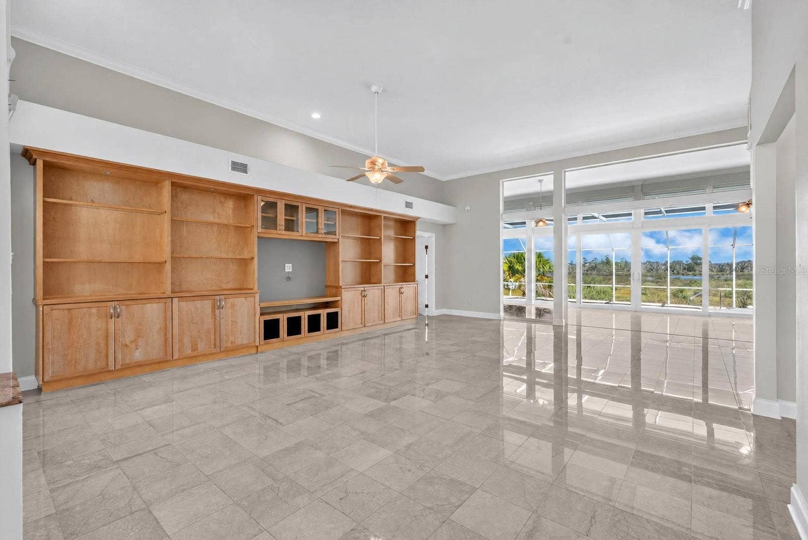 74 COVINGTON LANE, Palm Coast, FL 32137 Spacious Living with Custom Built-Ins