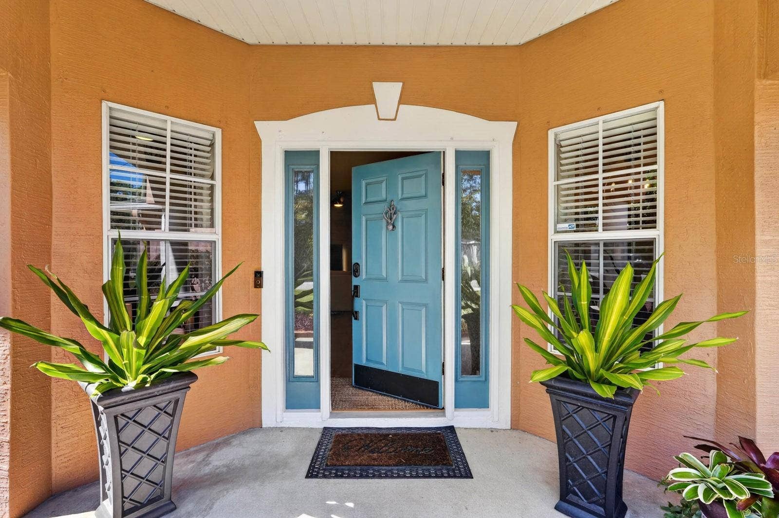 70 PICKERING DRIVE, Palm Coast, FL 32164 Welcoming covered front patio