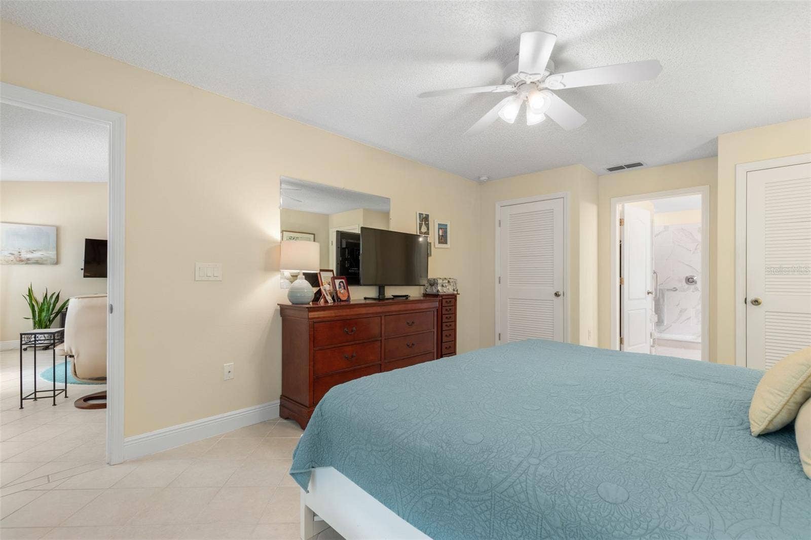Your own private retreat awaits! The primary suite offers generous space to unwind, with a thoughtfully arranged layout, ample closet storage, and the convenience of an adjoining bath.