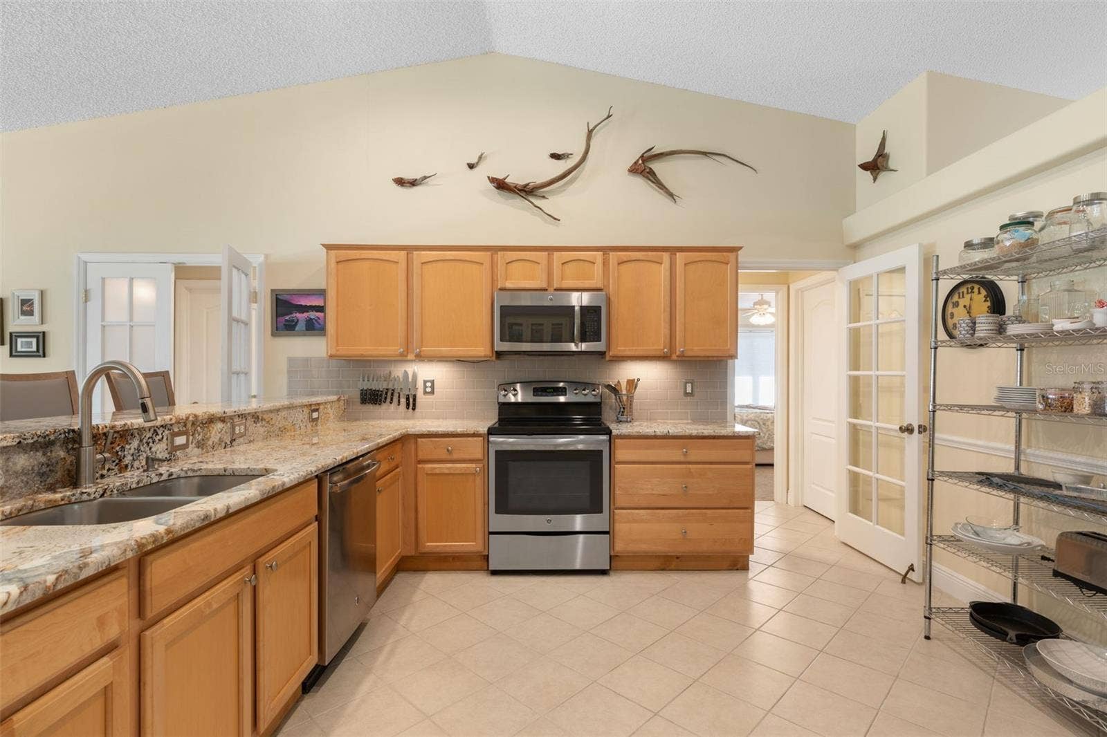 Everything has its place in this thoughtfully arranged kitchen, where ample storage keeps essentials close at hand and a practical layout makes everything from weeknight dinners to elaborate recipes a pleasure.