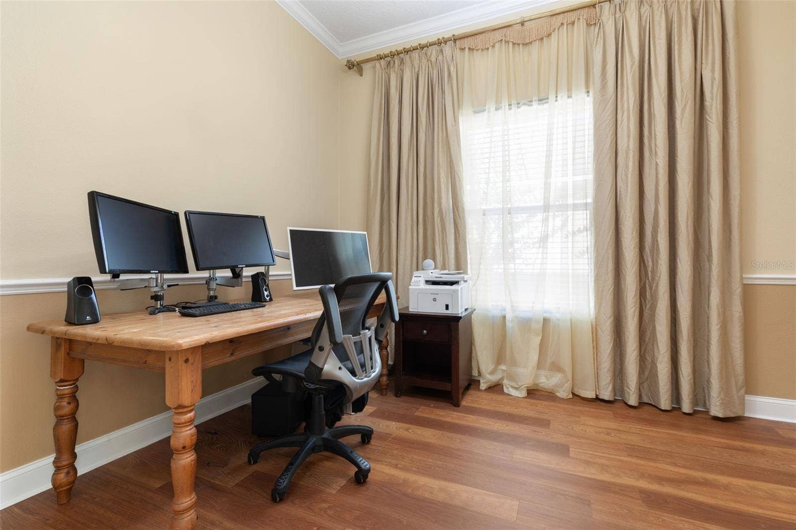 25 EMERALD LAKE COURT, Palm Coast, FL 32137 A versatile office/den offering a flexible space for working from home, pursuing hobbies, or creating a room that suits your needs.