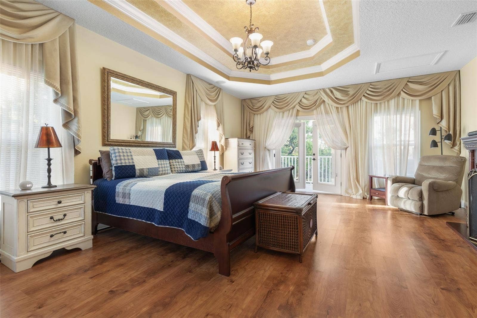 25 EMERALD LAKE COURT, Palm Coast, FL 32137 A versatile upstairs retreat currently used as a primary bedroom, offering a private space to relax and unwind.