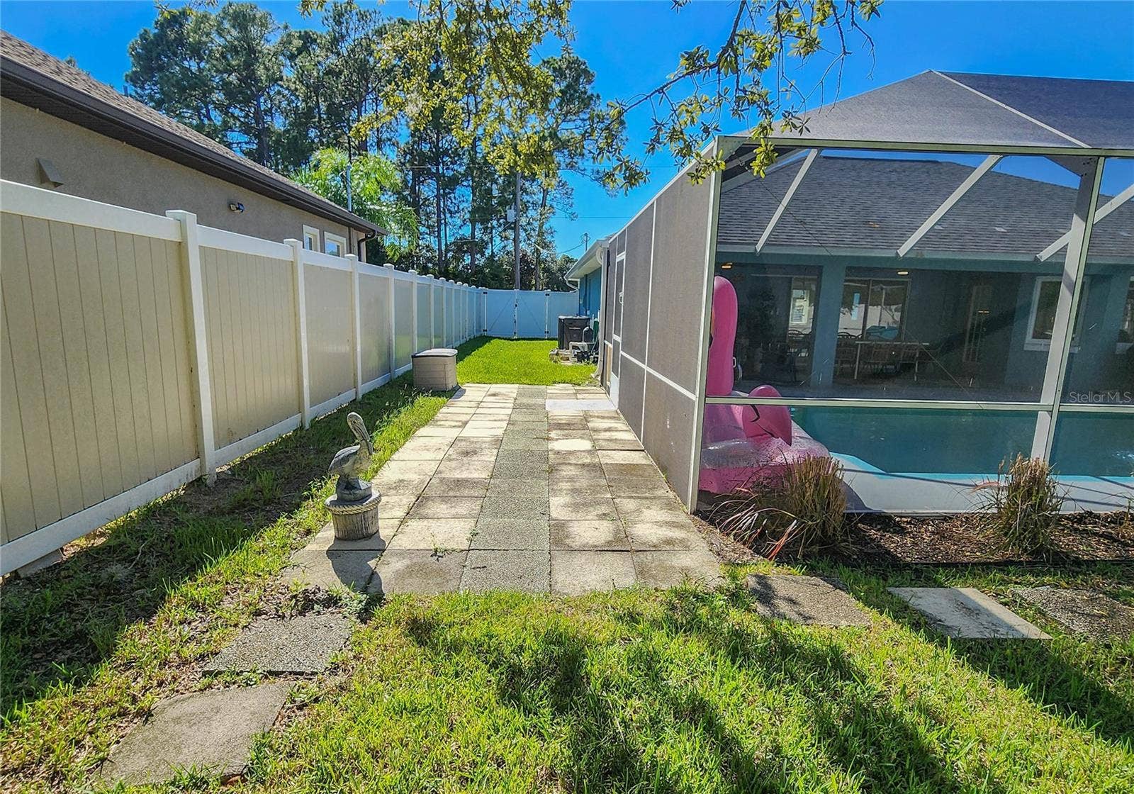 118 FERNDALE LANE, Palm Coast, FL 32137 Other side with double gate