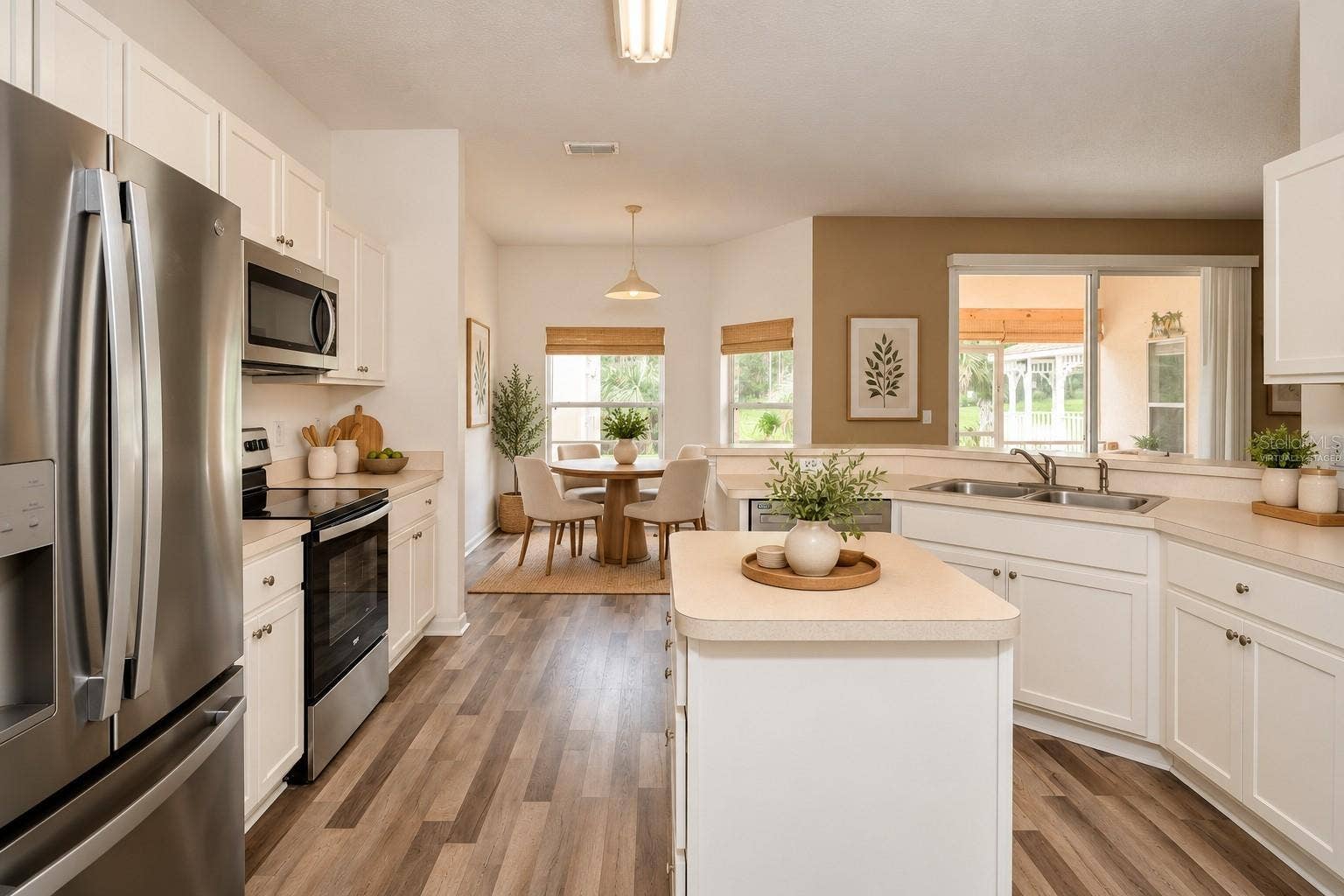 46 LLAMA TRAIL, Palm Coast, FL 32164 Virtually Staged Kitchen overlooking Breakfast Nook