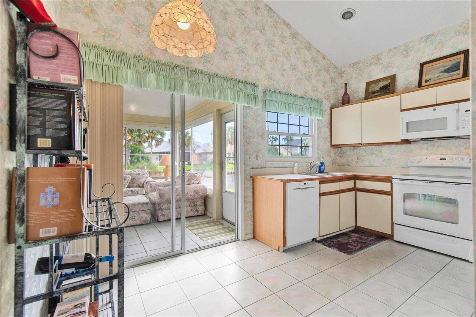 50 MEDFORD DRIVE, Palm Coast, FL 32137 Eat in kitchen opens to Florida room