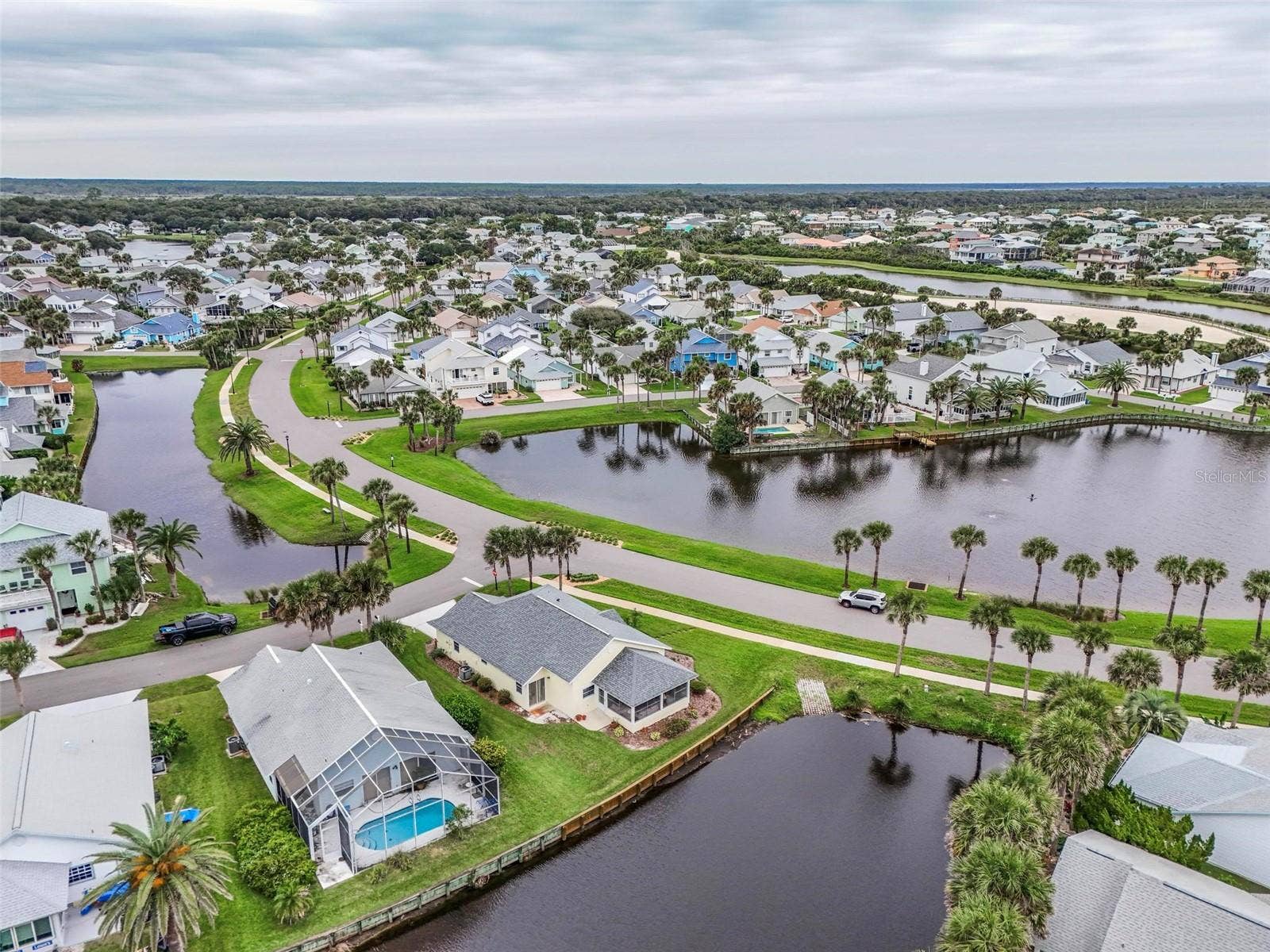 50 MEDFORD DRIVE, Palm Coast, FL 32137 Intracoastal at top of picture-canal in front-Lake view with fountain in front of house and canal behind. Beautiful water views-Watch nature! Hear the waves!