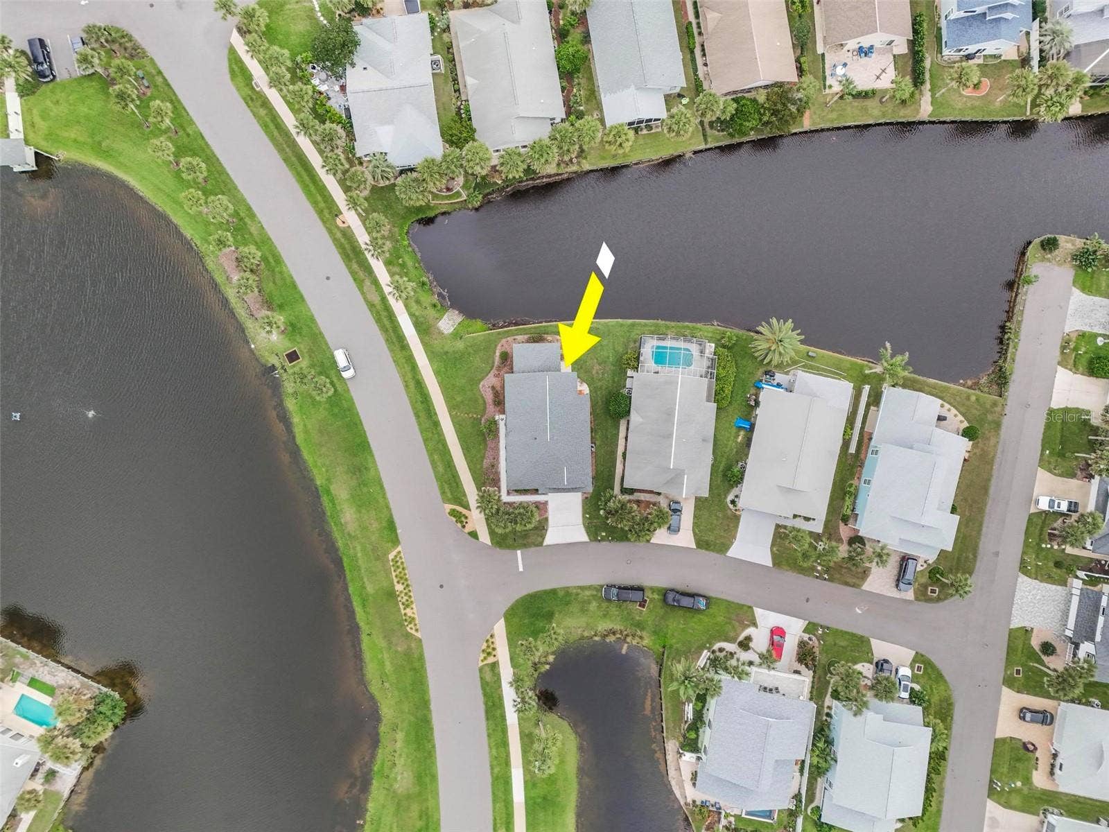 50 MEDFORD DRIVE, Palm Coast, FL 32137 View of lake across the street and canal in front canal in back steps to ocean