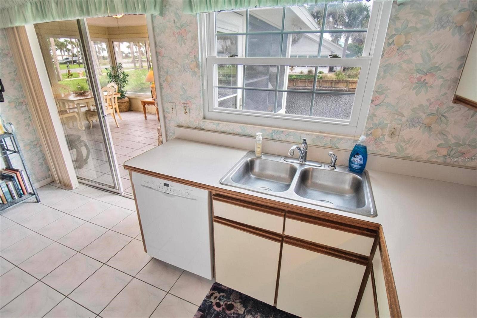 50 MEDFORD DRIVE, Palm Coast, FL 32137 Slider opens to Florida room