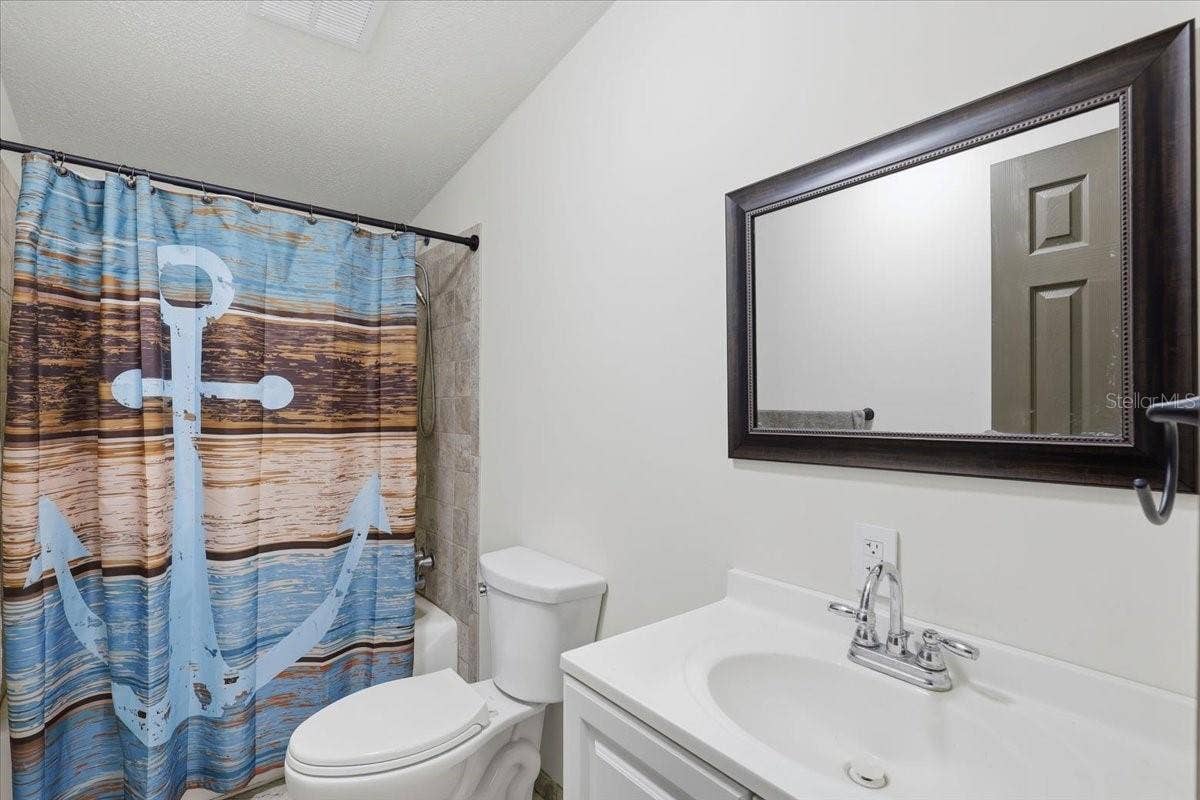 9860 NIKOLICH AVENUE, Hastings, FL 32145 3rd bathroom with tub