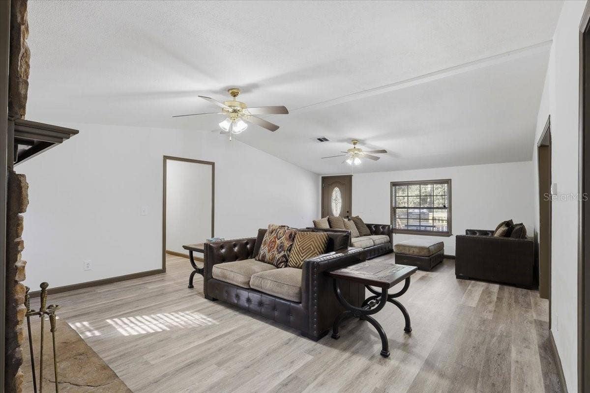 9860 NIKOLICH AVENUE, Hastings, FL 32145 Entrance with Living Room and Family Room