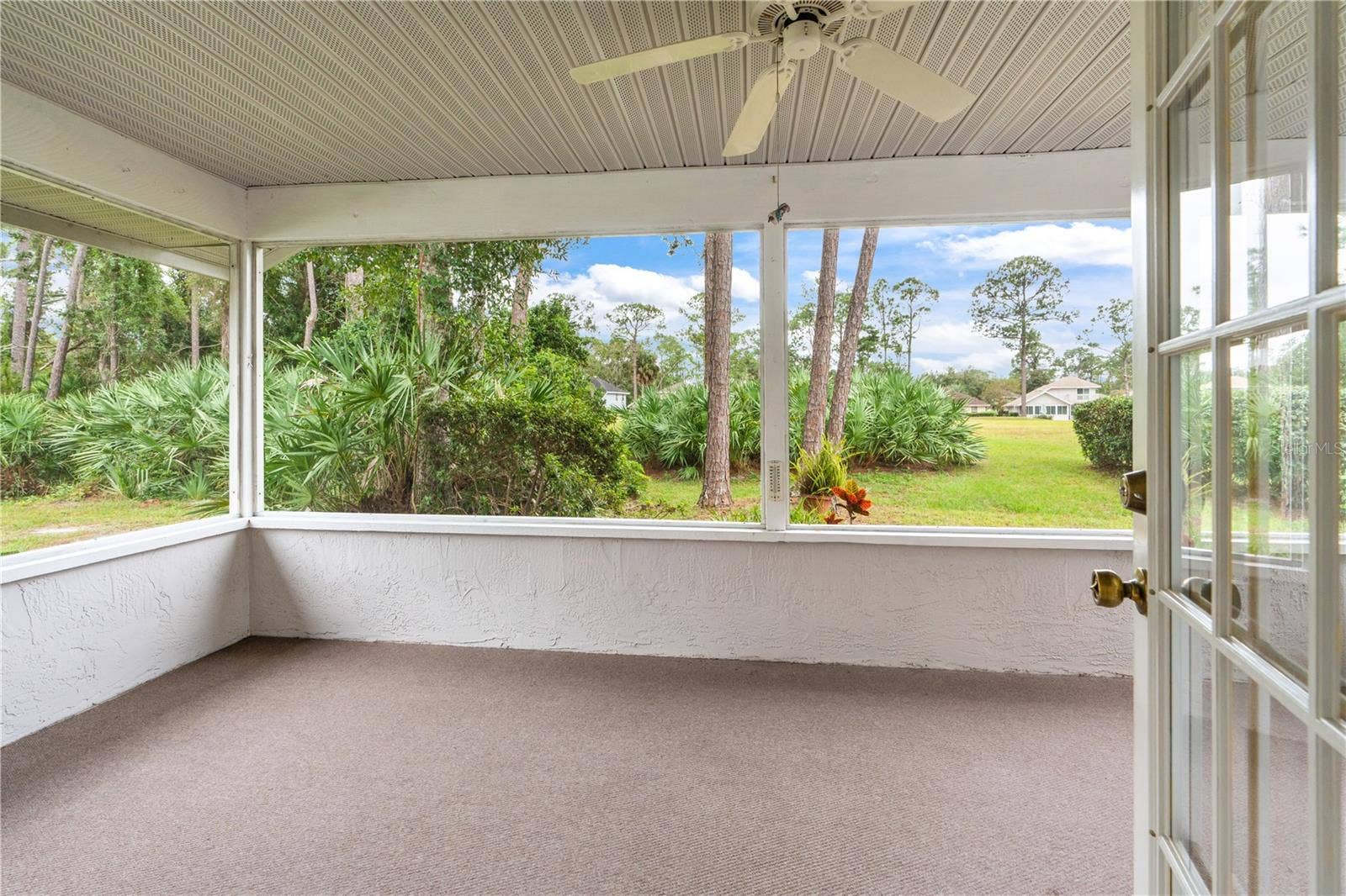 245 GLENBRIAR CIRCLE, Daytona Beach, FL 32114 Screened Porch Overlooks Backyard