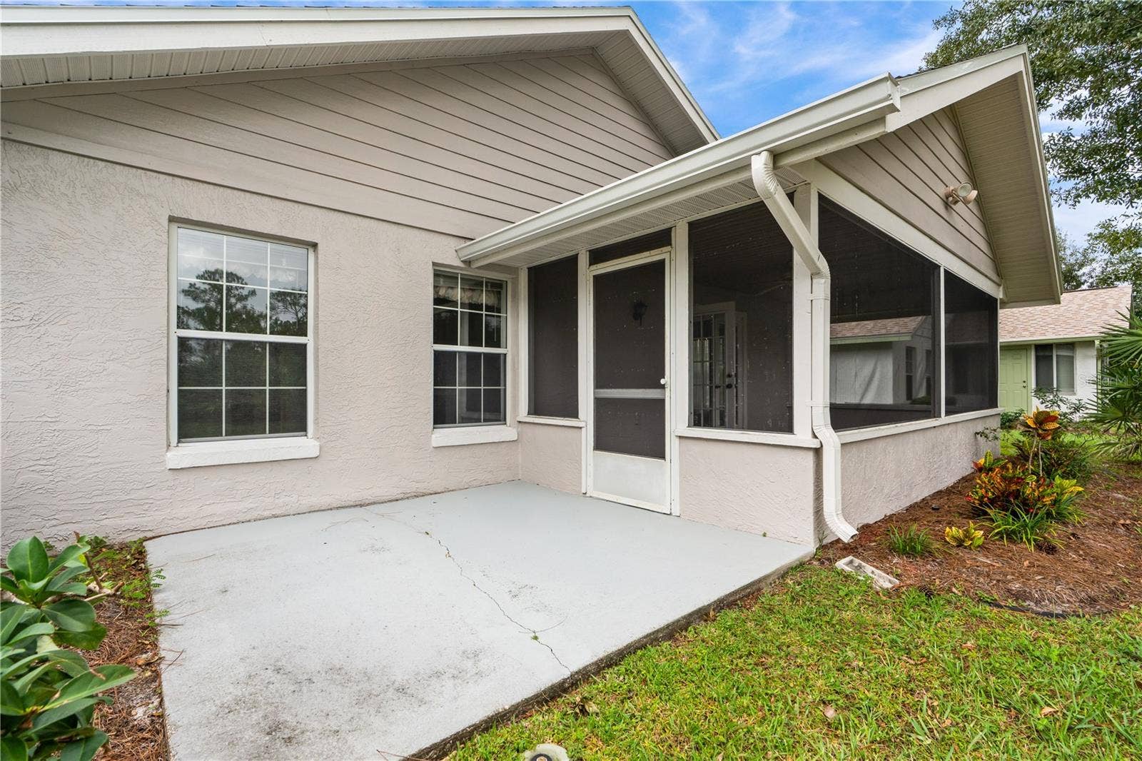 245 GLENBRIAR CIRCLE, Daytona Beach, FL 32114 Open Patio off Screen Porch