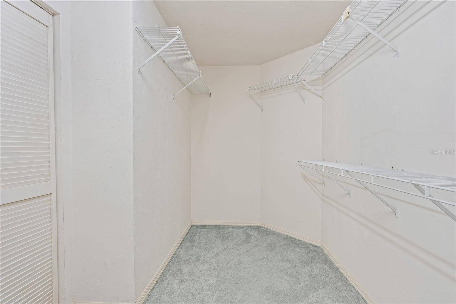 245 GLENBRIAR CIRCLE, Daytona Beach, FL 32114 Walk In Closet - 12'x7'
