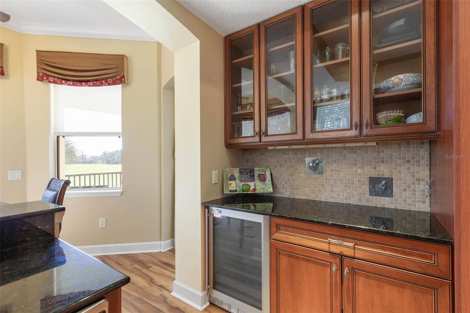 Wine refrigerator, plenty of cabinets and a view!!
