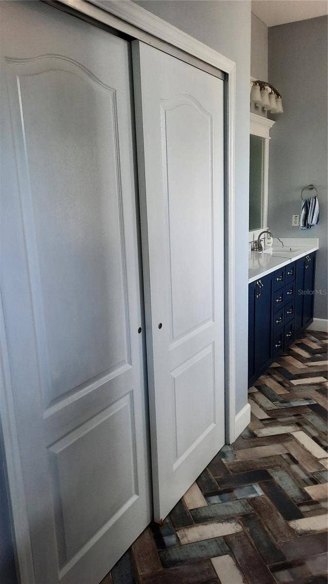 3621 GALWAY LANE, Ormond Beach, FL 32174 Linen closet in primary bathroom