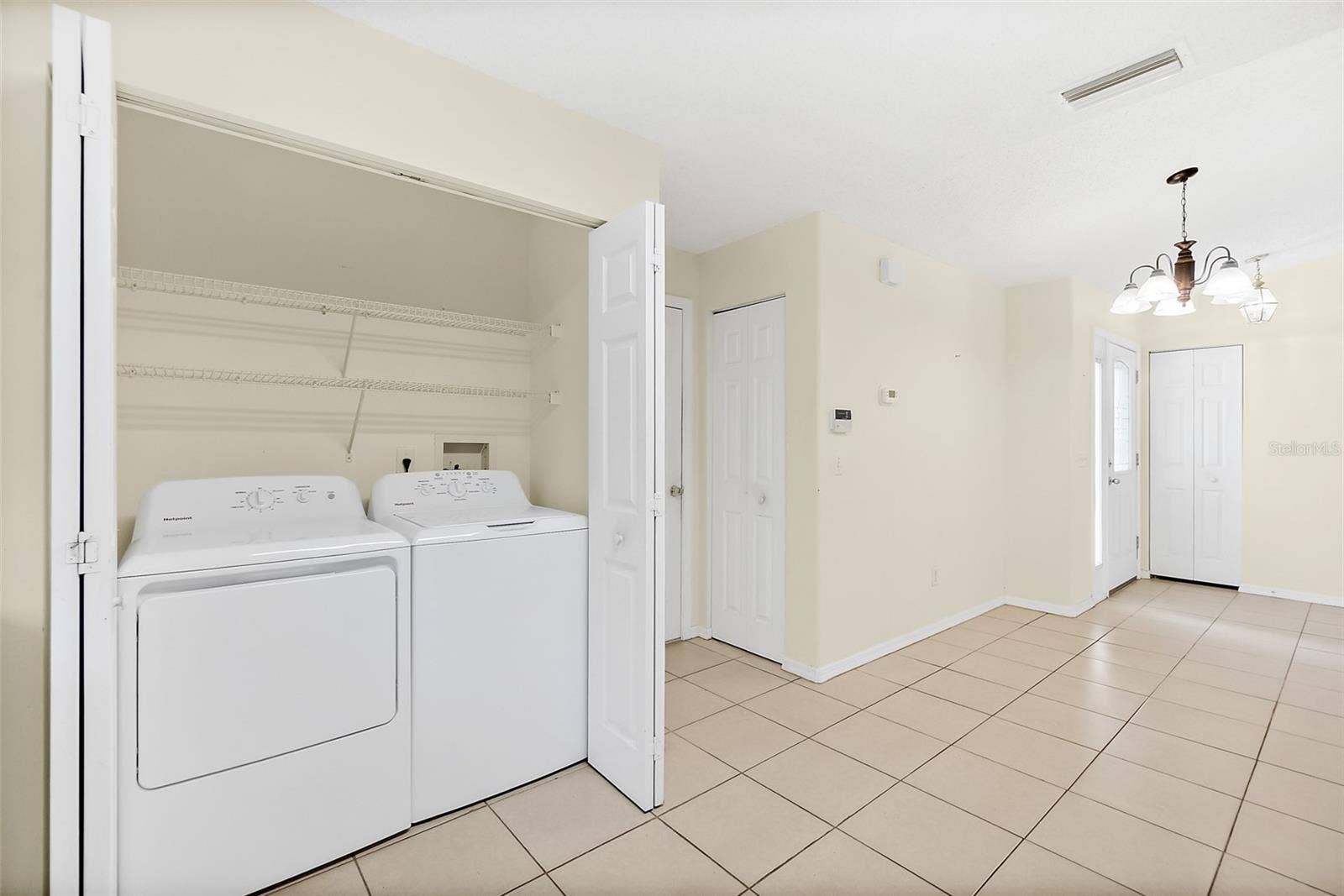 16 SLUMBER MEADOW TRAIL, Palm Coast, FL 32164 Laundry in Kitchen