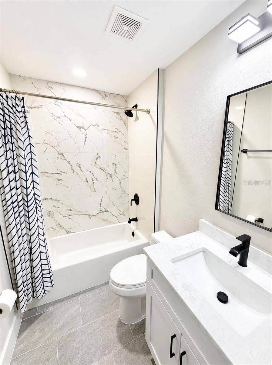 14 LAMOYNE LANE, Palm Coast, FL 32137 second bath full tub tile floors