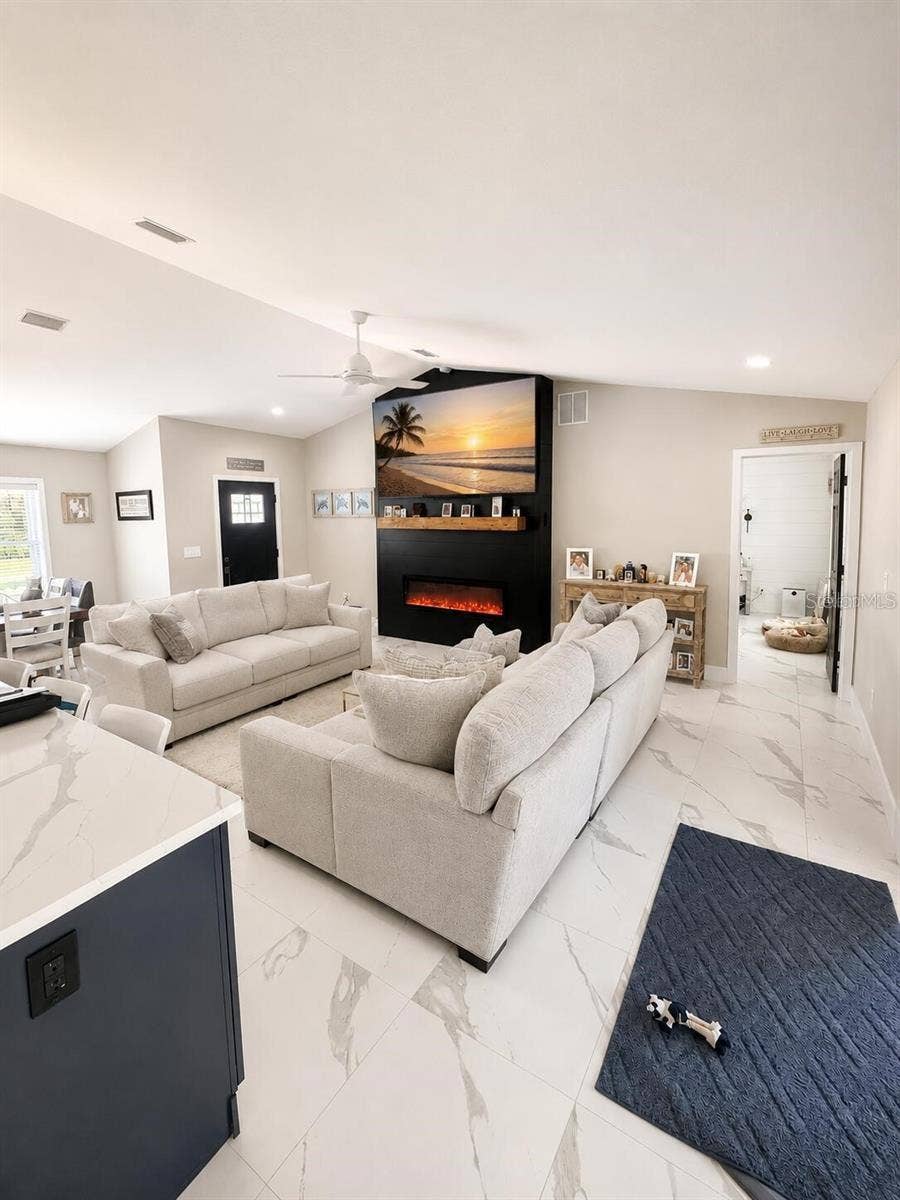14 LAMOYNE LANE, Palm Coast, FL 32137 living room kitchen open floor plan