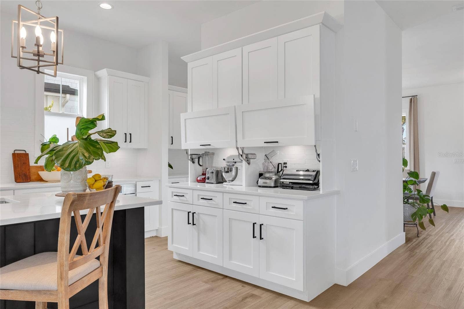 906 ALLENDALE LANE, Winter Garden, FL 34787 Elegant appliance garage keeps countertops beautifully organized while providing convenient access to every day essentials