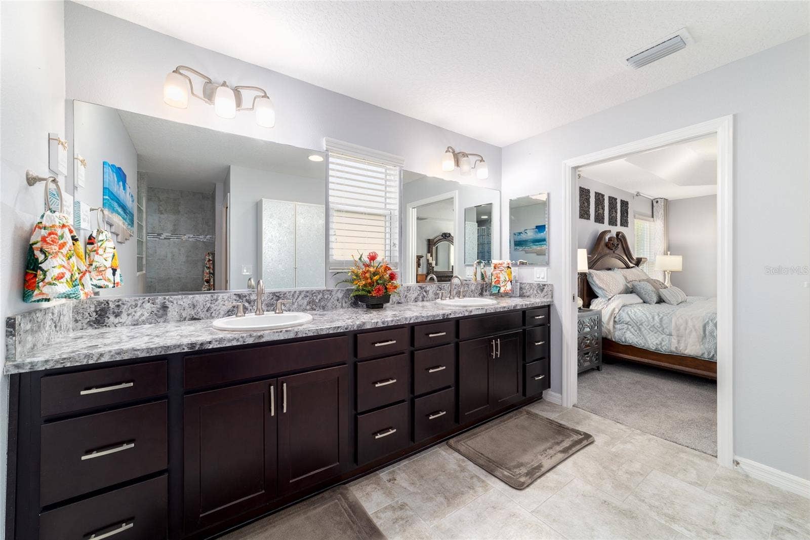 Dual vanities in the primary bath with a private water closet