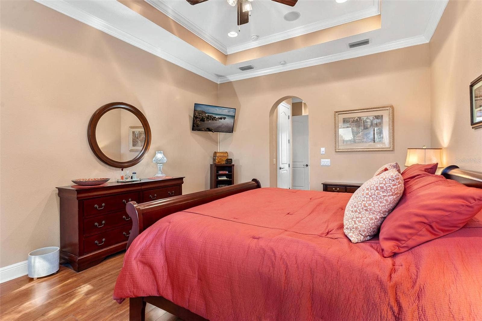 Primary Suite features wood look laminate flooring...