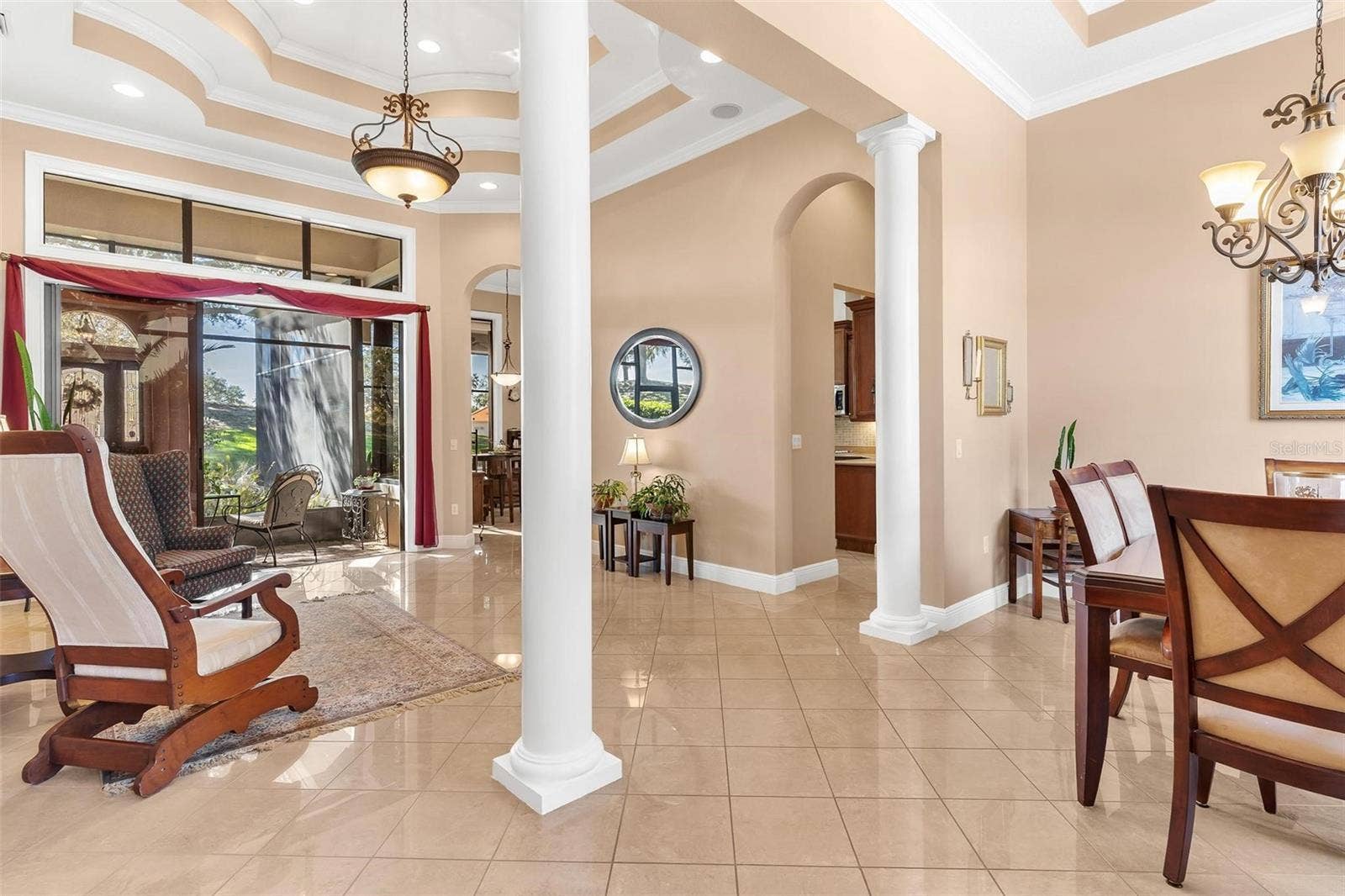 Formal Living area with gorgeous tile & private screen Porch