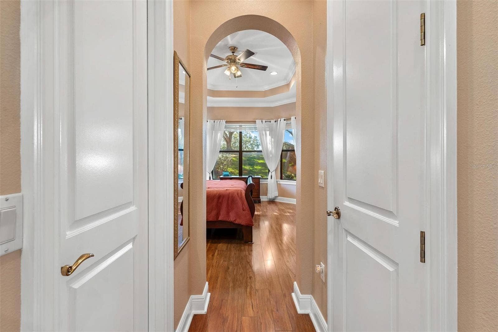 Doors lead to Primary Suite...